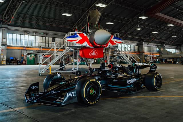 RAF Typhoon ‘Blackjack’ with a Mercedes-AMG PETRONAS Formula One car. Photo: Mercedes-AMG PETRONAS F1 Team