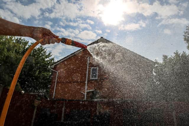 Hosepipe attached to a water tap. The North West Region of England is to be hit with a hosepipe ban next month due to the recent heatwave the highest on record for the time of year.