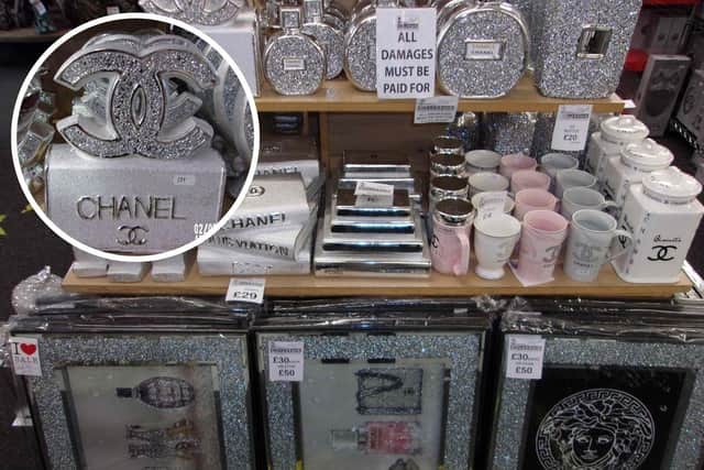 Some of the counterfeit designer goods that were on sale.