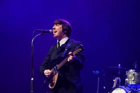 Mark Bloor as John Lennon