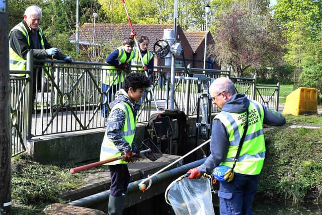 Horncastle Rivercare members clearing out the. River Waring
