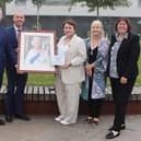 Councillor Tim Mitchell, Councillor Rob Waltham, Holly-Mumby-Croft MP, Councillorr Elaine Marper and Councillor Julie Reed with the plaque at the official renaming of Church Square. Image: North Lincolnshire Council