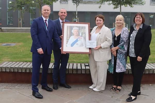 Councillor Tim Mitchell, Councillor Rob Waltham, Holly-Mumby-Croft MP, Councillorr Elaine Marper and Councillor Julie Reed with the plaque at the official renaming of Church Square. Image: North Lincolnshire Council