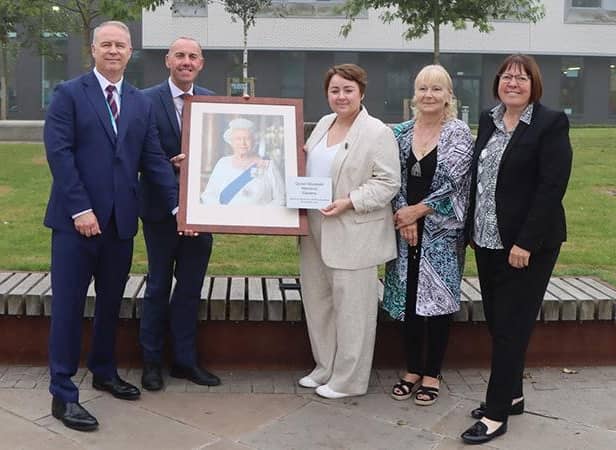 Councillor Tim Mitchell, Councillor Rob Waltham, Holly-Mumby-Croft MP, Councillorr Elaine Marper and Councillor Julie Reed with the plaque at the official renaming of Church Square. Image: North Lincolnshire Council