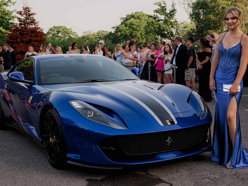 Matching blue Ferrari and dress!