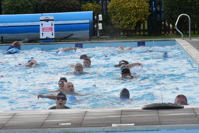 Swimmers in the triathlon.