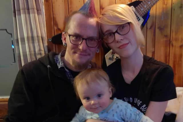 Adi Whiting and his young family pictured at The Carpenters Arms pub in Boston. Image supplied.