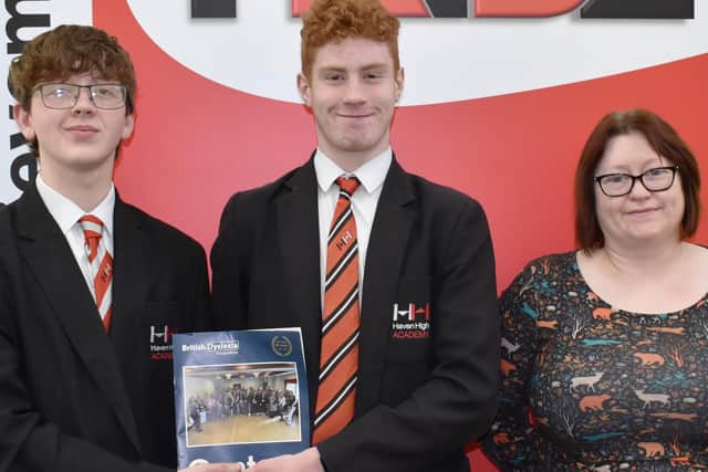 Claire Wilkinson pictured with some students from Haven High Academy celebrating the awarding of the Quality Mark.