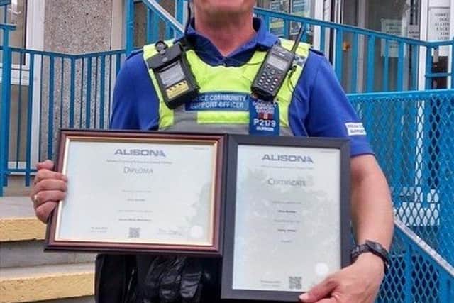 PCSO Bunker certificates he received  for promoting the work of PCSOs on social media.