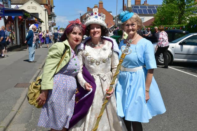 Even the 'Queen' popped along to enjoy the fun. Dressed for nostalgia are (from left) Donna Attrill, Louise Rushworth and Margaret Burgin