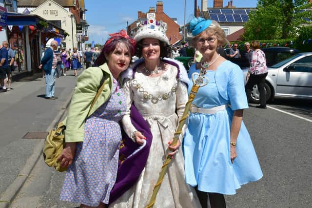 Even the 'Queen' popped along to enjoy the fun. Dressed for nostalgia are (from left)  Donna Attrill, Louise Rushworth and Margaret Burgin