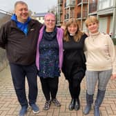 Deirdre Speed from Morton, Gainsborough is hosting Oleg, Olena. They are pictured with Rev Kate Bottley.