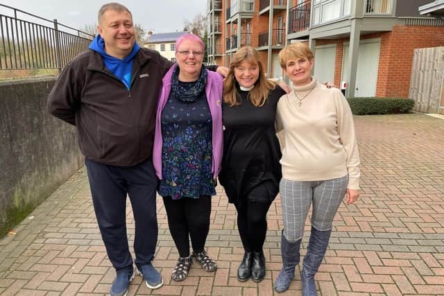 Deirdre Speed from Morton, Gainsborough is hosting Oleg, Olena. They are pictured with Rev Kate Bottley.