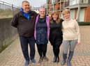 Deirdre Speed from Morton, Gainsborough is hosting Oleg, Olena. They are pictured with Rev Kate Bottley.