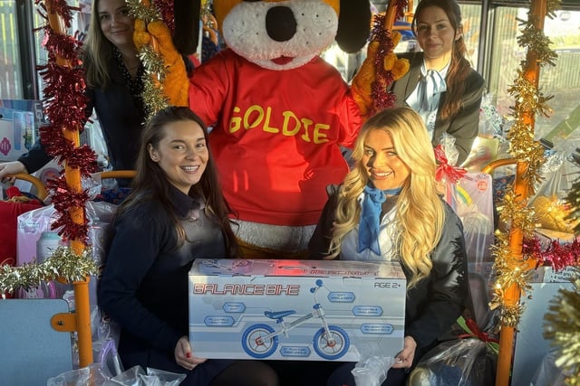 The Mission Christmas bus filling up with toys.