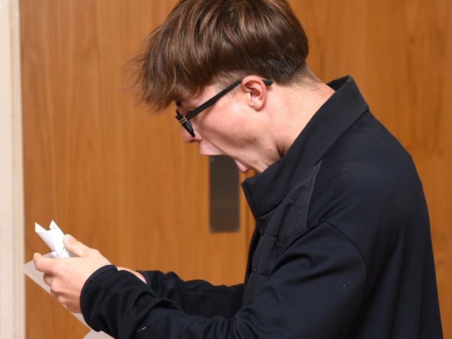 Joe Harries' shock as he opens his results.
