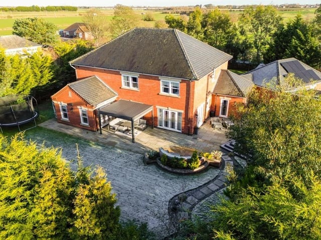 An aerial view of the rear of the property.