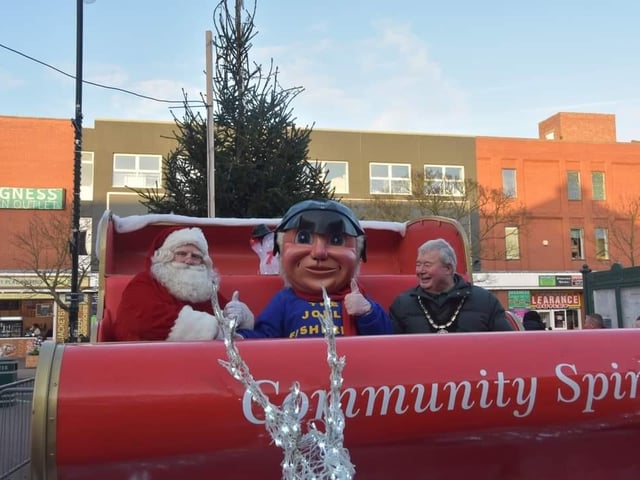 Ho, ho, ho - Santa in his sleigh outside the Hildreds Centre gets a visit from Mayor Coun Pete Barry and the Jolly Fisherman.