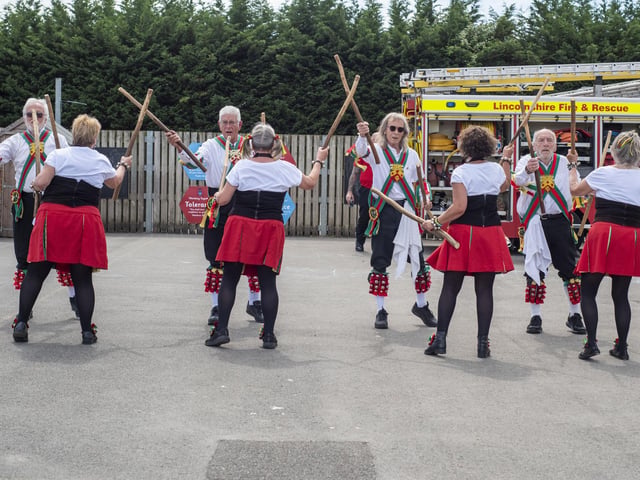 Kesteven Morris dancers perform Ring O'Bells on their 50th anniversary. Photo: Holly Parkinson