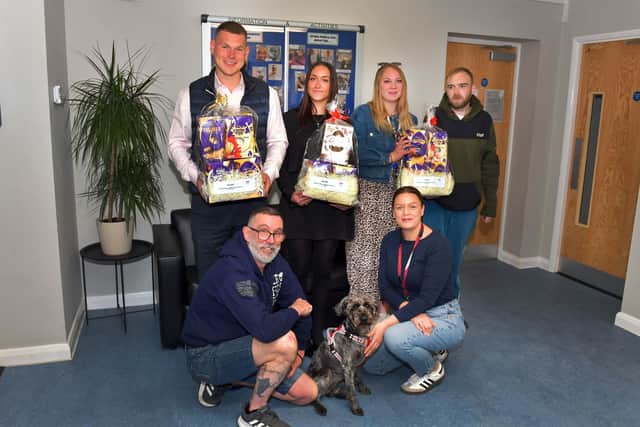 (Back L to R): Gelder Group Contracts Manager Marlow Blonde, Gelder Administrator Jade Sanderson, Corner House Team Leader Megan Morrison and resident Stuart Smith. (Front L to R): Support Worker James McFetridge, Geoff the dog and Service Manager Gayle Smith.