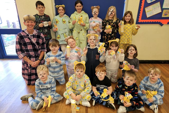 Raffle winners with headteacher Helen Duckett (left) at Winchelsea School. Photo submitted