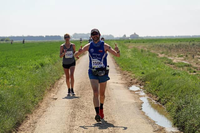 Jonathan Chapman celebrates a new PB. Photo by John Rainsforth.