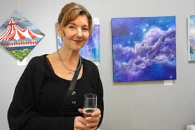 Gallery volunteer Lisa Price with some of her work on display at the exhibition launch evening.
