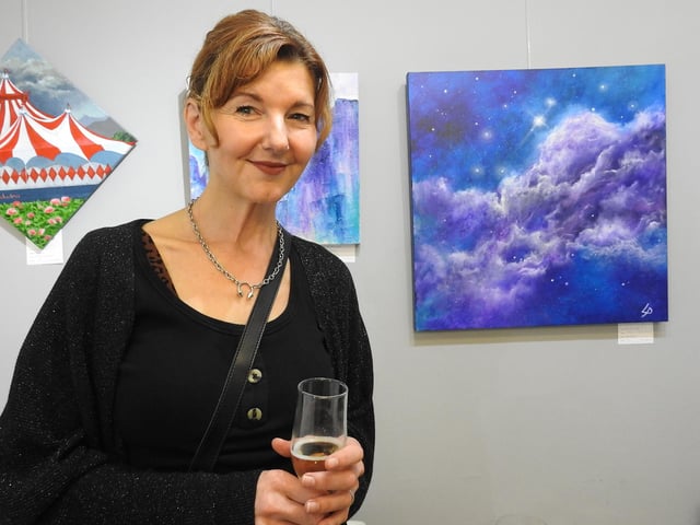 Gallery volunteer Lisa Price with some of her work on display at the exhibition launch evening.