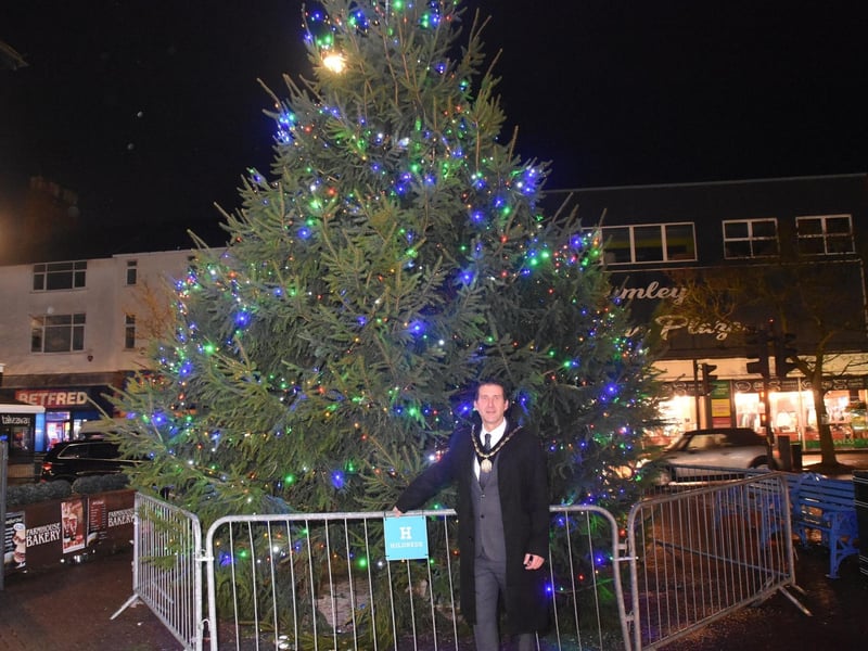 Mayor Coun Adrian Fridley with the Christmas tree outside the Hildreds Centre which is provided by Skegness Town Council.