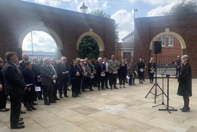 Coun Angela Lawrence, chairman of West Lindsey District Council, reading the proclamation to the crowd outside the Guildhall