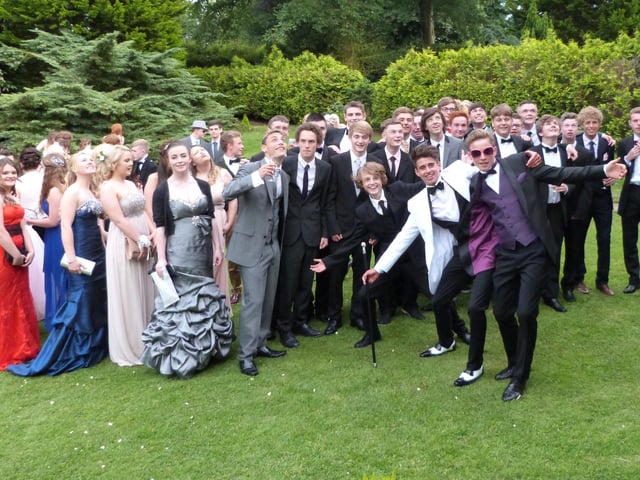 A scene from Caistor Yarborough Academy's Year 11 Ball of 2014. The event was held at the Oaklands Hotel, in Laceby. The pupils arrived in various modes of transport, including: a horse and carriage, a tandem bicycle, Harley Davidson motorcycles, a tractor, and numerous chauffeur-driven vehicles.