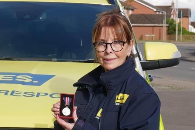Annie Wakeford with her special edition medal to celebrate the King’s Coronation,