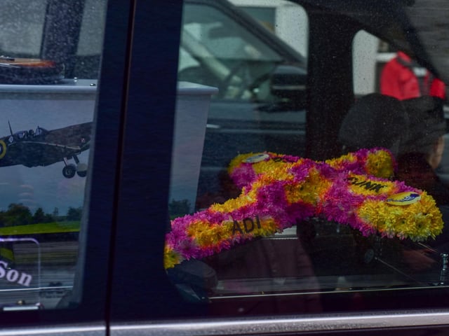 A spitfire-shaped floral wreath