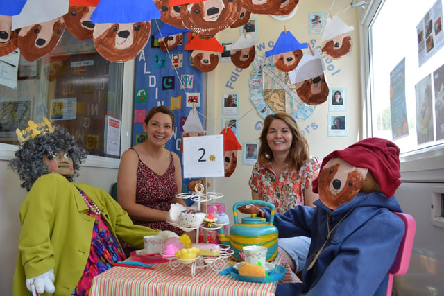 Tea with the Queen and Paddington Bear for Alana Nutting (left) and Abbie Cook