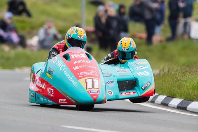 Ellis and Clement in the first race at the Isle of Man TT