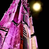 St James Church lit up in purple for polio. Photo: Paul Rudd, Louth.