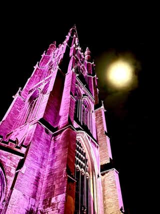 St James Church lit up in purple for polio. Photo: Paul Rudd, Louth.