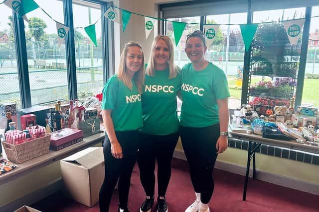 A raffle and tombola formed part of the fundraising. Pictured are Sam, Abi and Emma from the Boston Tennis Club.