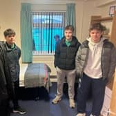 Academy students view university accommodation.