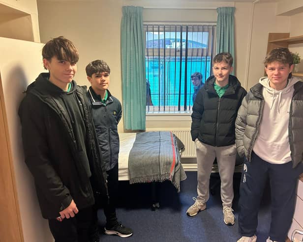 Academy students view university accommodation.