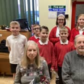 Year 6 present Mr Sharpe with a thankyou gift