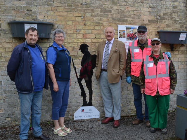 The Tommy, presented by Market Rasen Lions, with Lion president Lis Eastburn to the left.