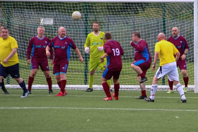 Scunthorpe MAN v FAT footballers play for charity