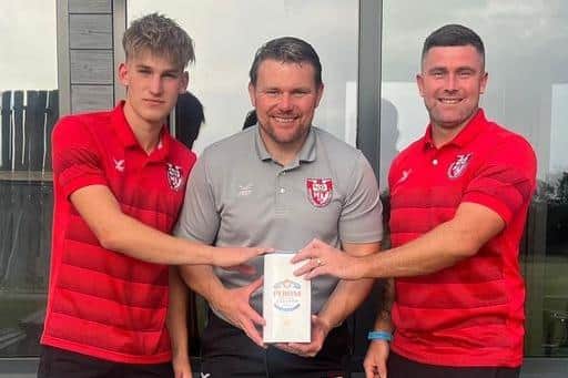Players of the match on Saturday, Reece Pemberton (left) and Scott Lowman (right), with joint-boss John Rawdon.