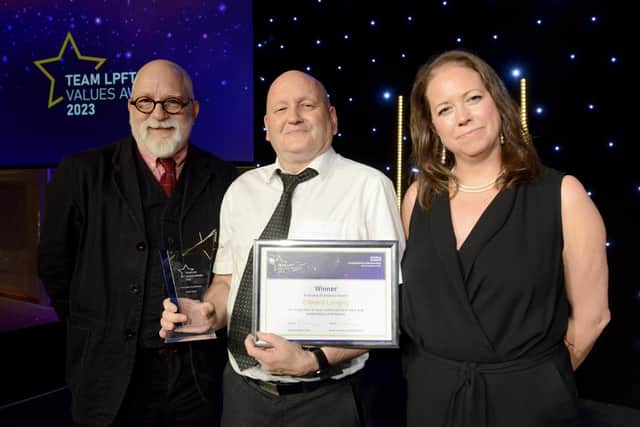 Winner Edward Langley, a support worker in Boston, pictured with Kevin Lockyer and Sarah Connery.