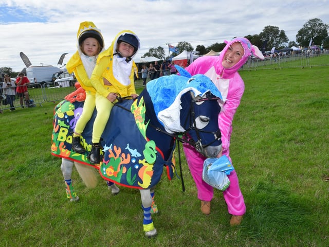 Clemmie Pastor, Merrie Pastor 8 and Izzy Pastor in the pony fancy dress contest