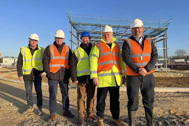 Representatives from the Council and its project board visited Sleaford Moor Enterprise Park to see progress onsite, including the first steels now up. Pictured from left: North Kesteven District Council Economy and Place Director Andy McDonough, Chief Executive Ian Fytche, Director of Resources Russell Stone, Deputy Council Leader Councillor Ian Carrington and Council Leader Councillor Richard Wright.