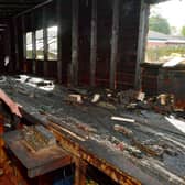 Sean Malone of Boston, shows us the devastating impact of the fire on his model railway collection and sentimental items from his family travels.