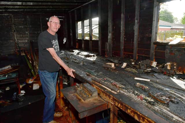 Sean Malone of Boston, shows us the devastating impact of the fire on his model railway collection and sentimental items from his family travels.