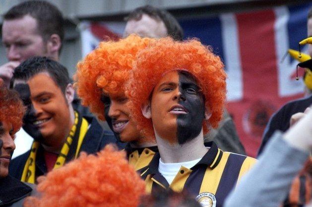 Facepaints and wigs created a carnival atmosphere.